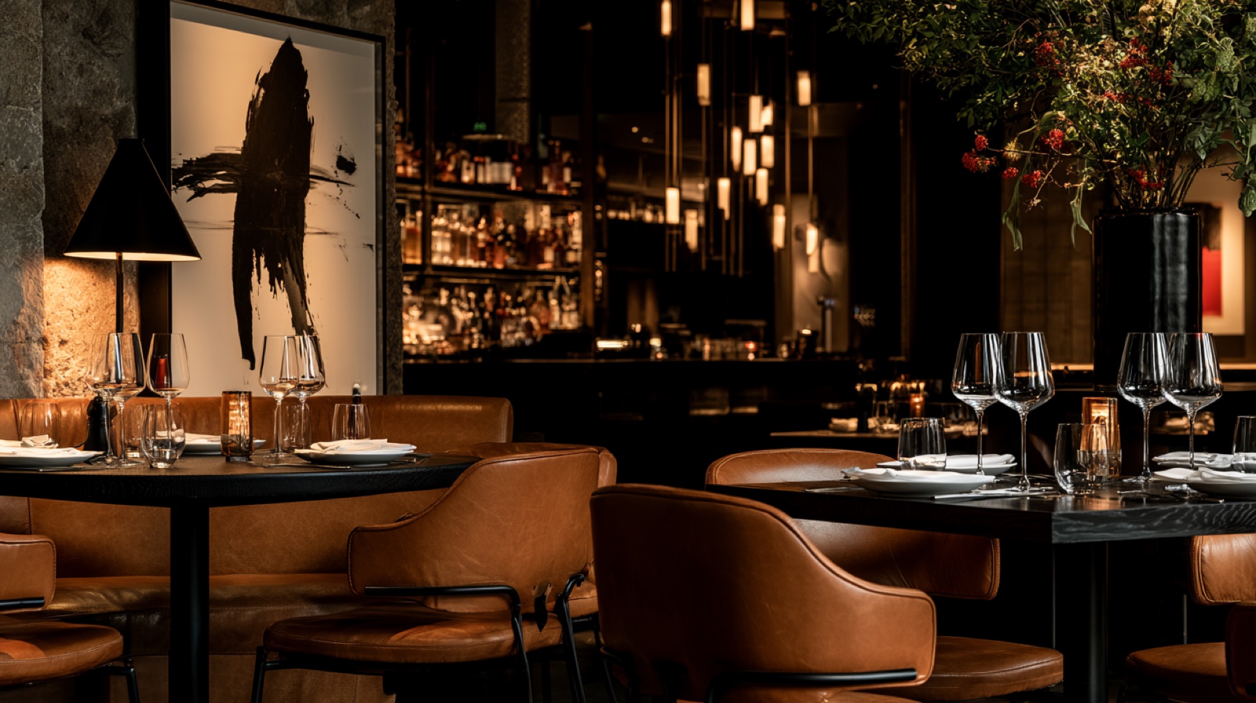 An amber-lit dining room at evening